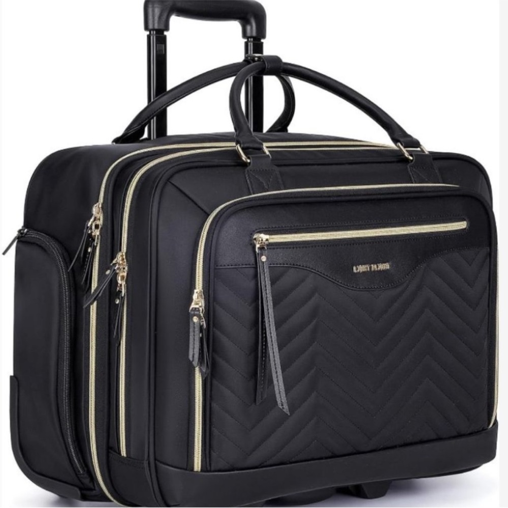 Light Flight quilted Black Travel rolling wheels.  Perfect carry on laptop bag.